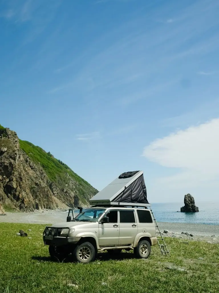 A Kuafo tent weathering rain on a mountain overland camp